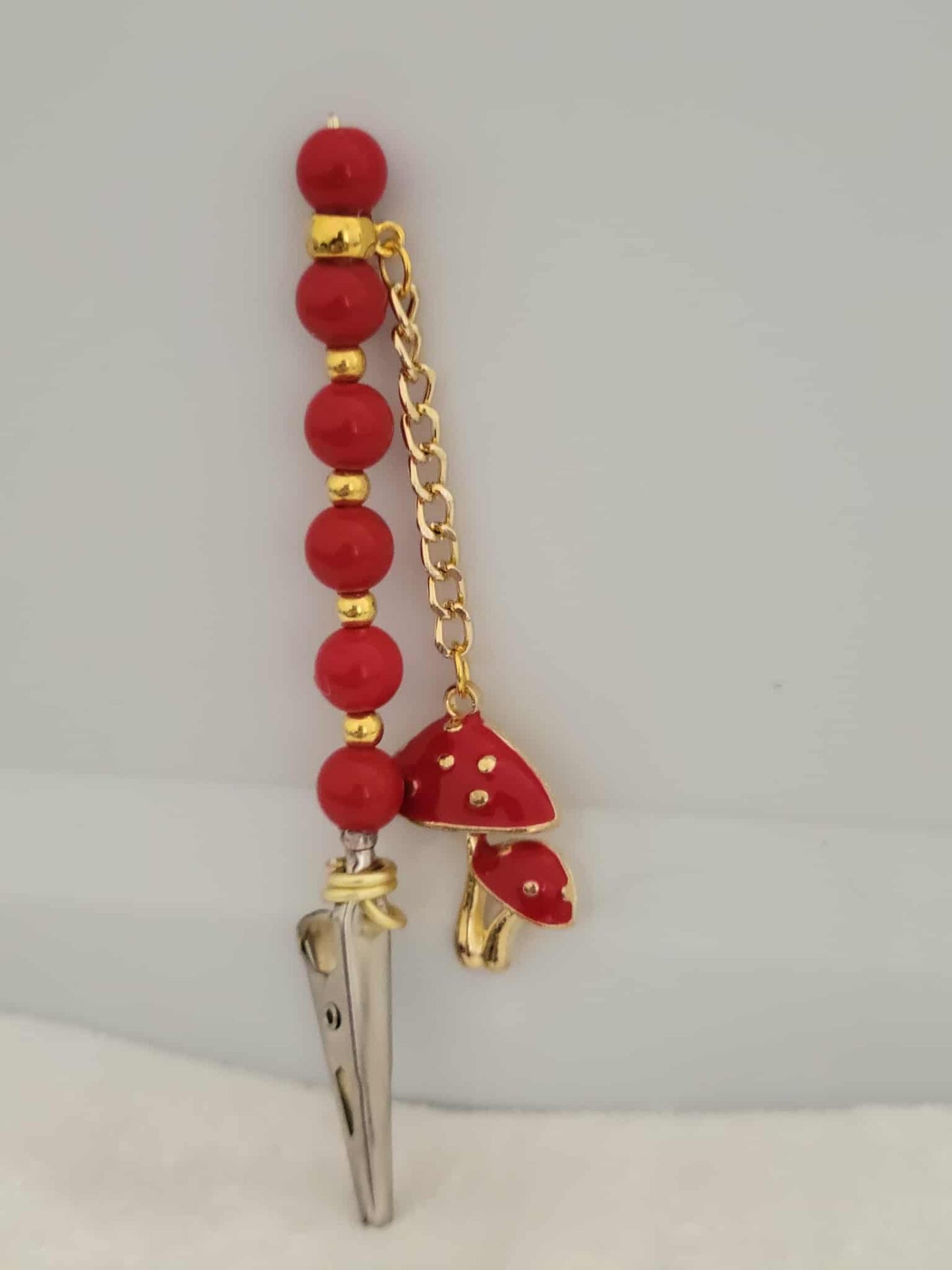 “Fungi & Fly High Roach Clip”