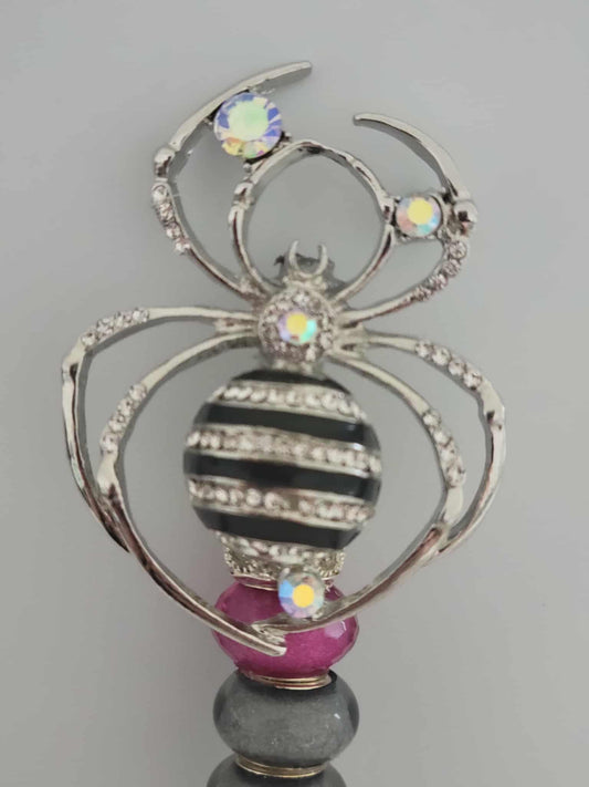 "Webbed Glamour: Handcrafted Spider-Themed Smoking Clip with Sparkling Elegance"