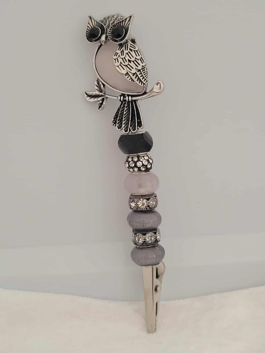 Decorative joint holder. Handmade Silver and opal owl roach clip with soft gray and opal-toned beads.